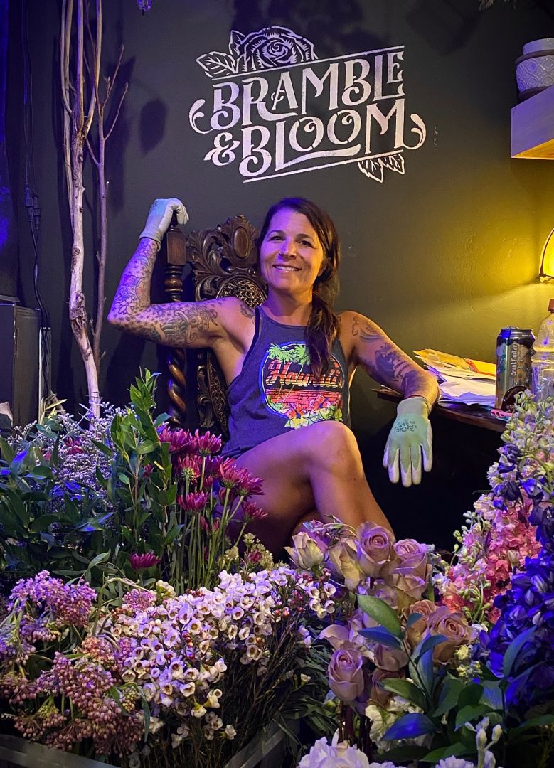 Headshot of the lead floral designer.