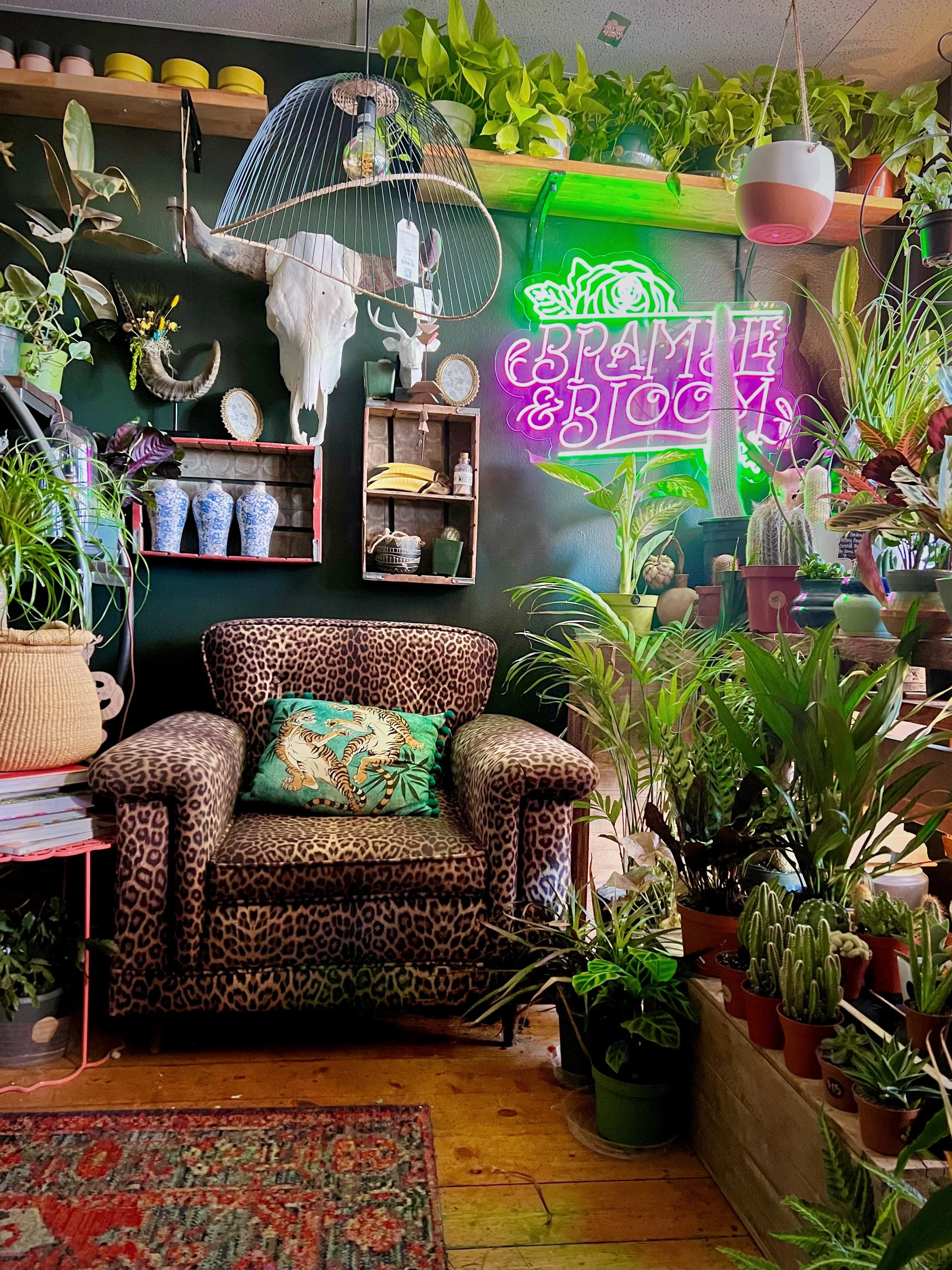 The shop counter with vases and flowers.